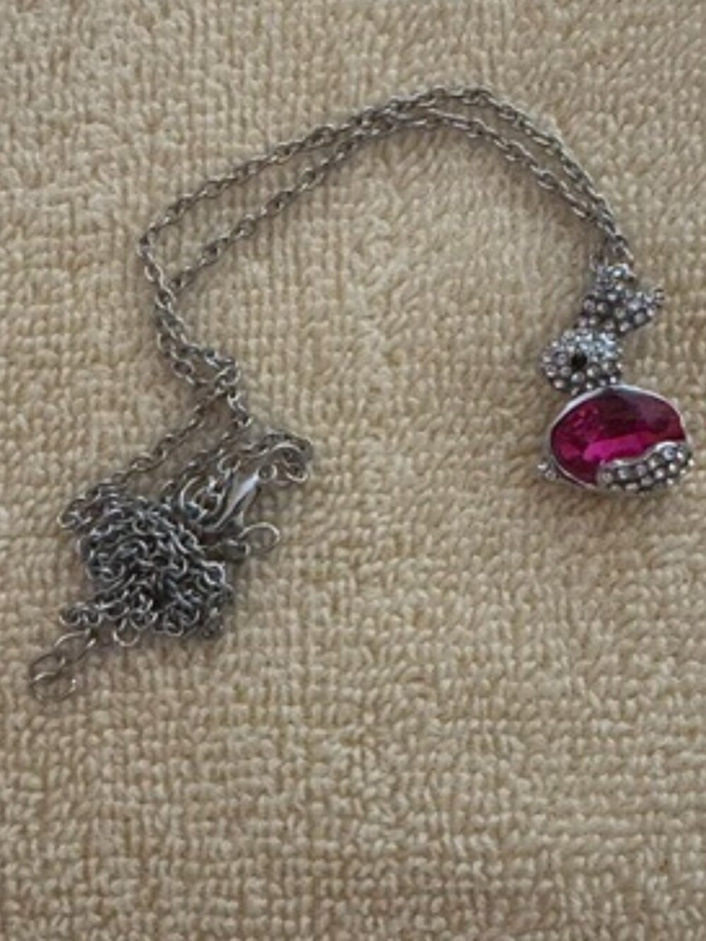 Lady's necklace with pink rabbit with stones